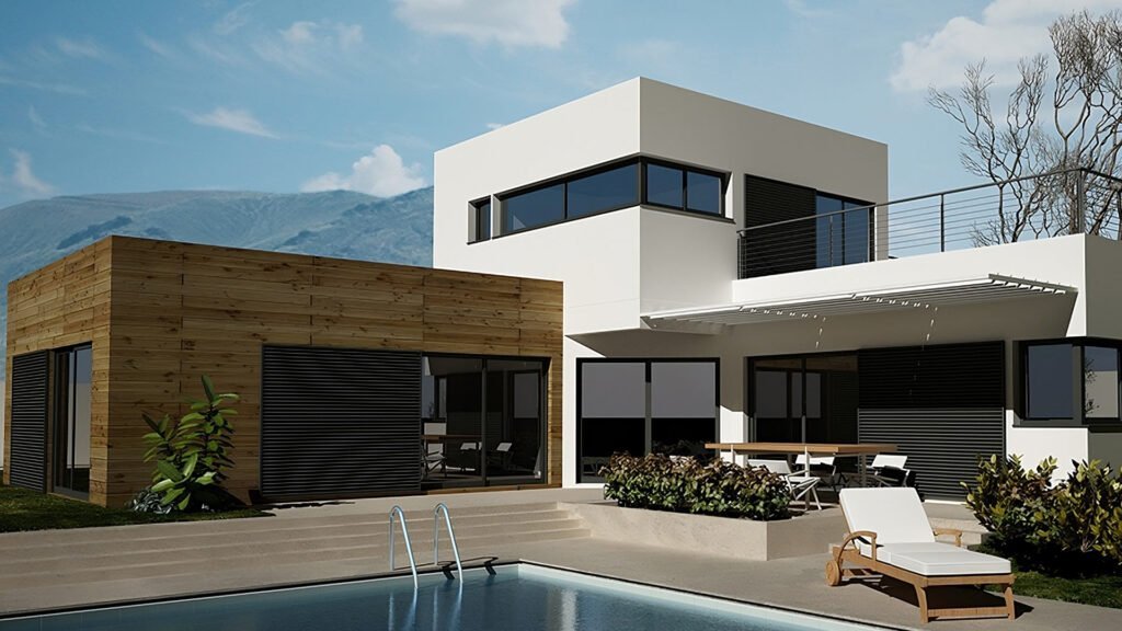 Une maison moderne avec une piscine, des murs blancs et des accents en bois, située au pied d’une montagne.